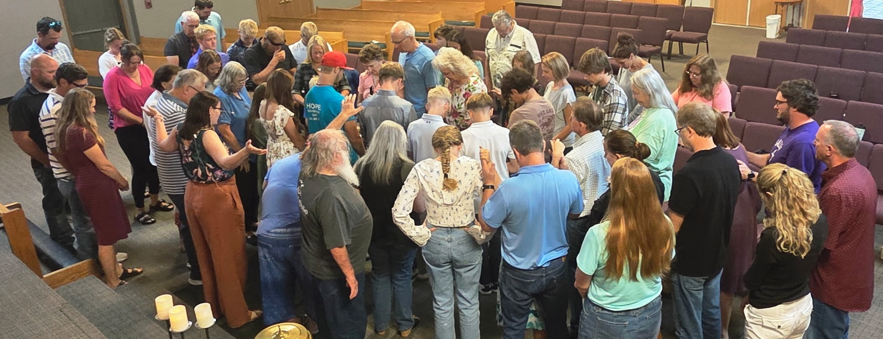 Hope congregation gathered together in prayer